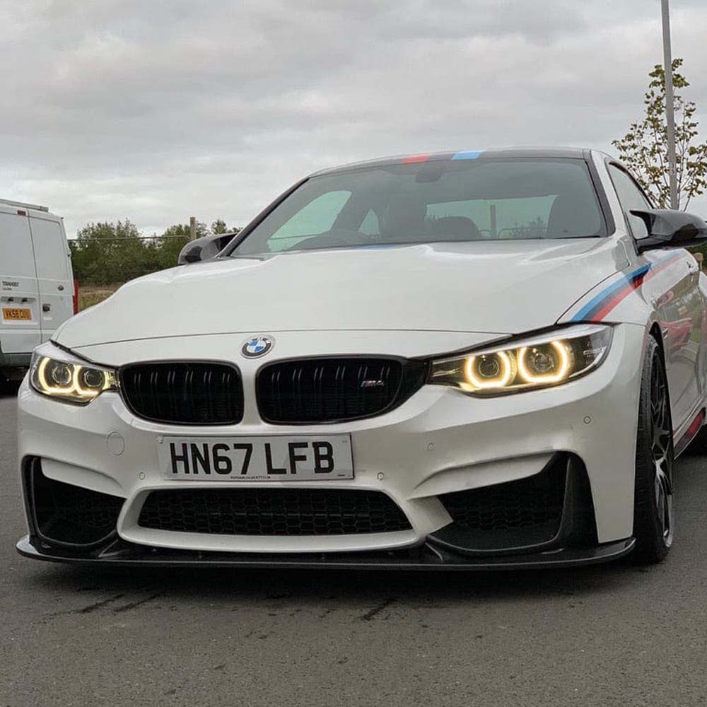 BMW M3 M4 F80 F82 F83 carbon fibre splitter by CT Carbon, showcasing a 3D-style front splitter with sleek carbon fiber design.