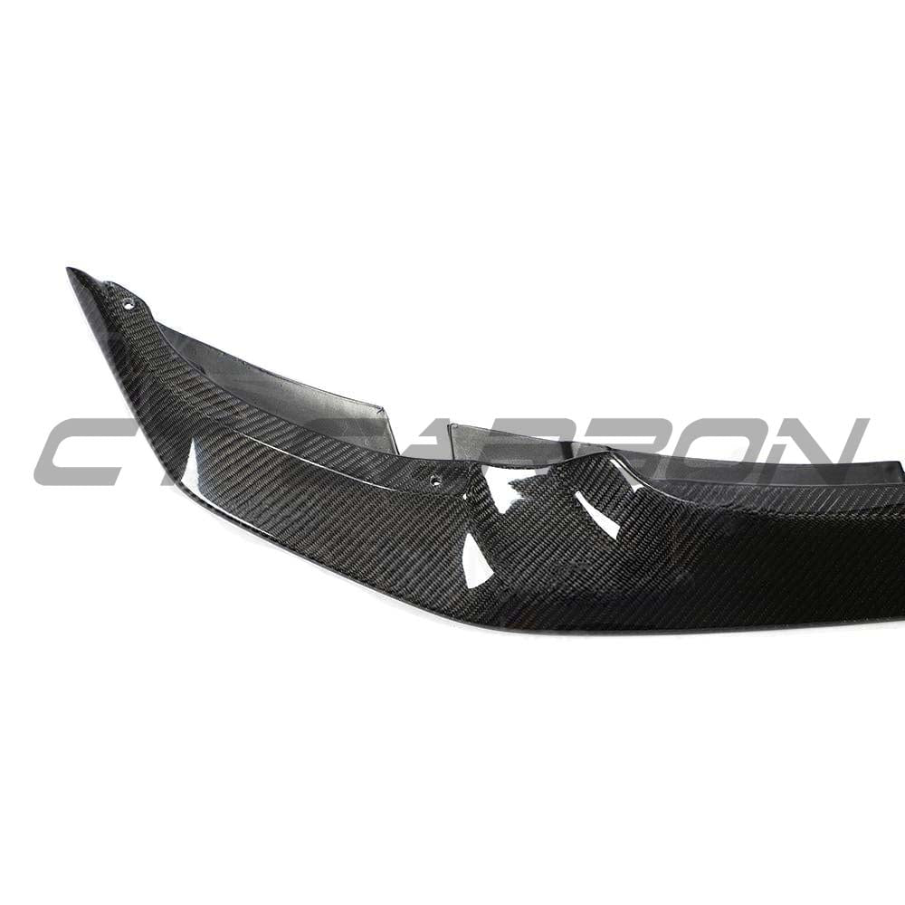 BMW M3 M4 F80 F82 F83 carbon fibre splitter by CT Carbon, GTS style, showing the two-piece design on the front of the car.