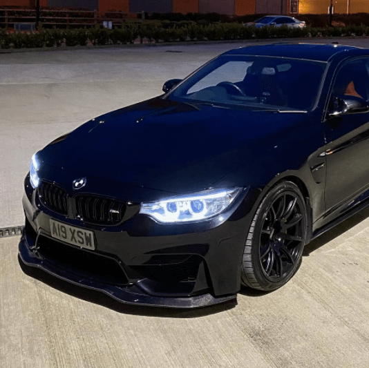 BMW M3 M4 F80 F82 F83 carbon fibre splitter by CT Carbon, showcasing the V8 style for enhanced aerodynamics and sporty look.
