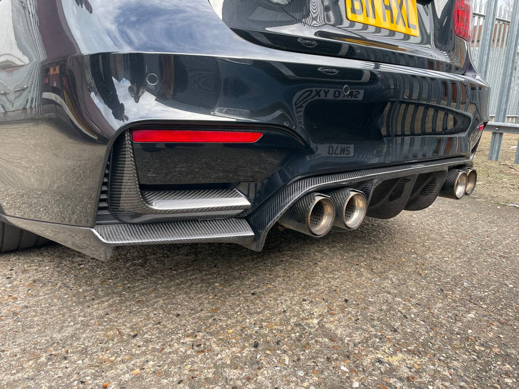 Full view of a BMW M4 F83 convertible with CT Carbon full carbon fibre kit including splitter and body parts.