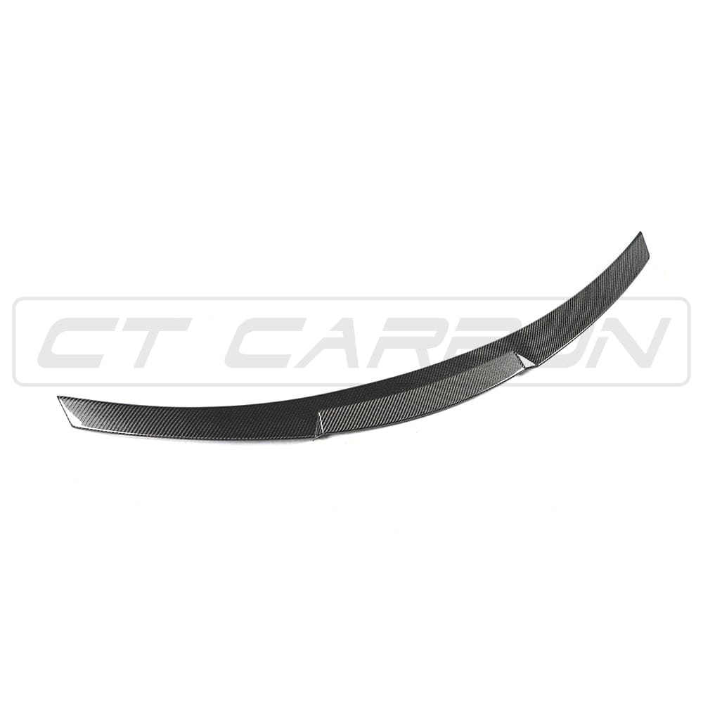 Full view of BMW M4 F83 convertible with CT Carbon full carbon fiber kit including splitter and body accents.