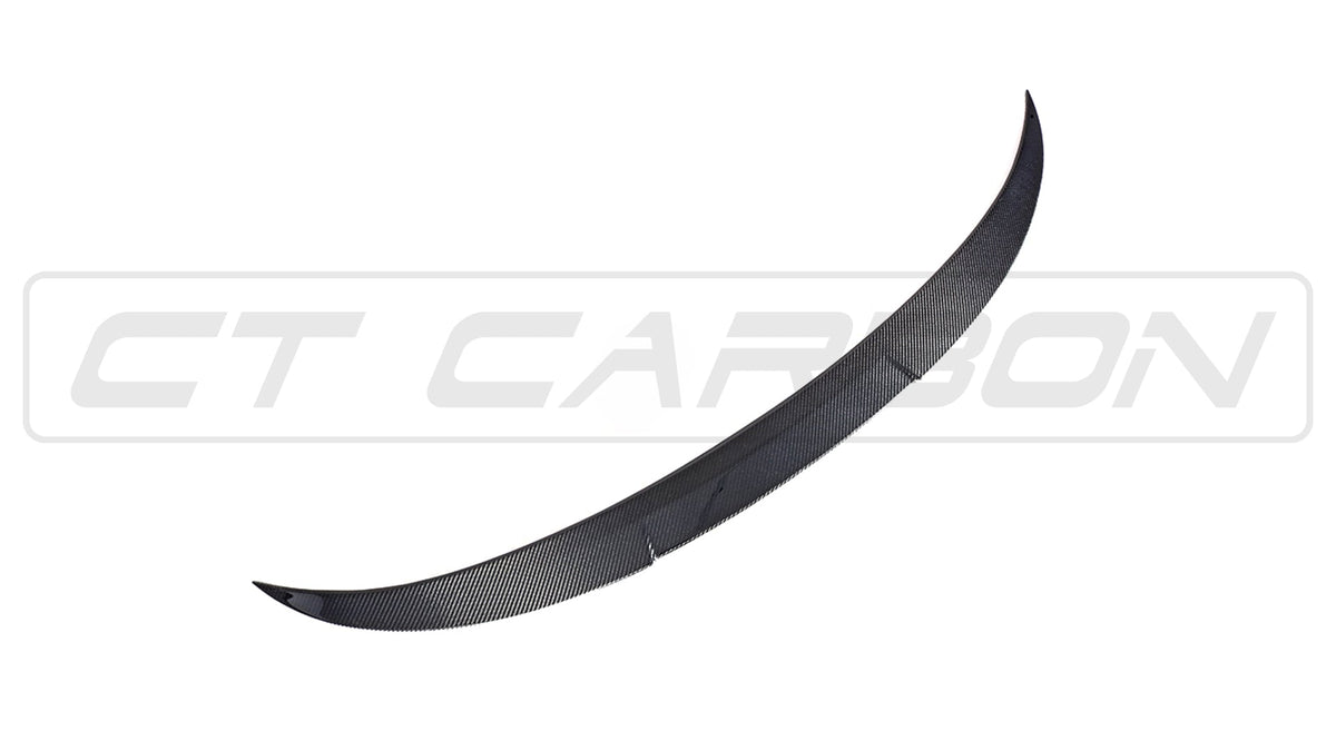 Full view of a BMW M4 F83 convertible with CT Carbon full carbon fiber kit including splitter and body accents.