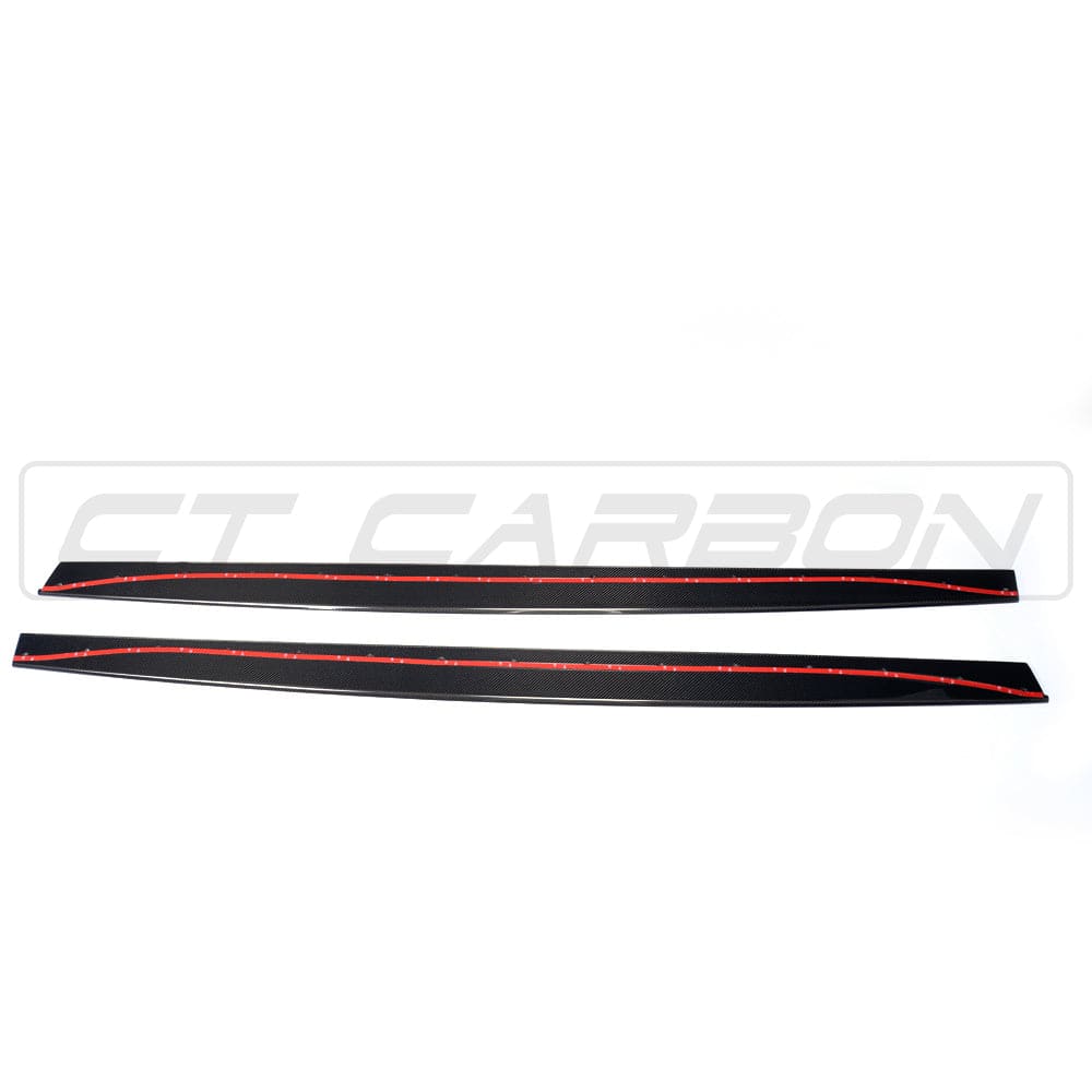 BMW M4 F83 convertible full carbon fiber kit by CT Carbon, featuring splitters and aerodynamic enhancements on the car.