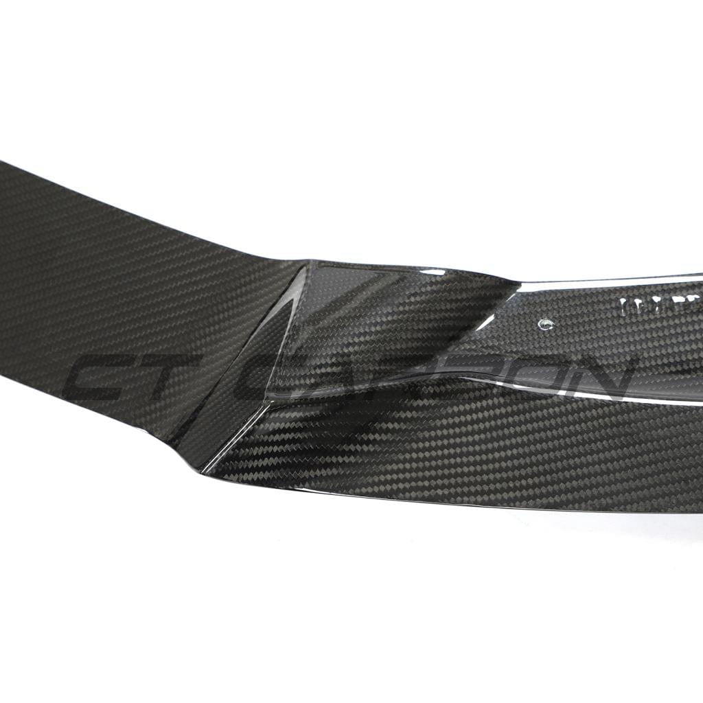 Tesla Model Y MK1 2020-2025 carbon fiber splitter by CT Carbon, shown on front bumper, enhances aerodynamics and sporty look.