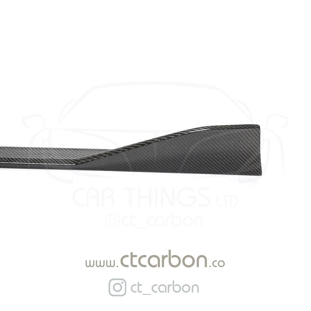 Full view of a Toyota Supra 2019+ A90 with CT Carbon V2 full carbon fibre kit, showcasing carbon fibre splitter and body accents.