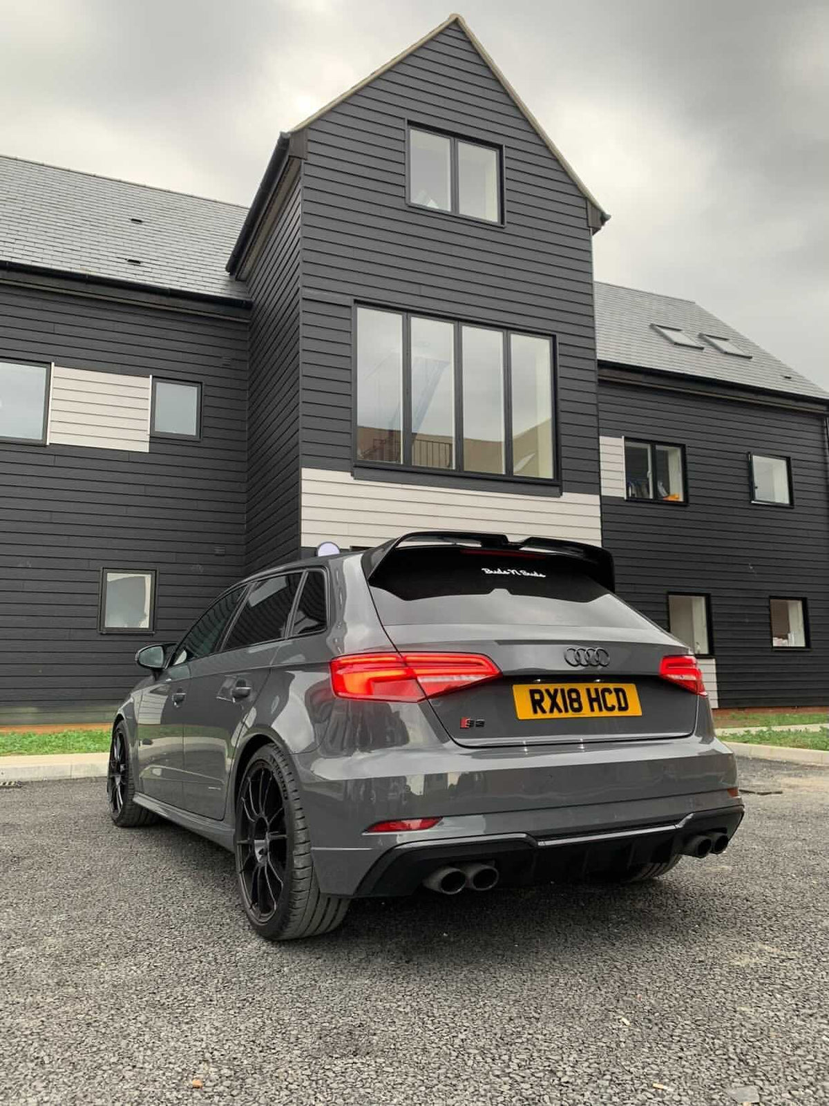 Carbon fibre spoiler for Audi A3 S-Line and S3 Sportback 8V by CT Carbon, shown on the hatchback with sleek aerodynamic design.