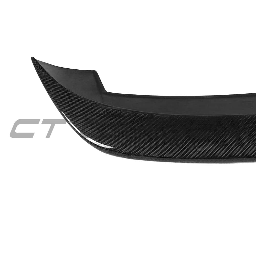 Carbon spoiler for BMW 1 Series F20 M Sport by CT Carbon, featuring a 3D-style design for enhanced sporty appearance.