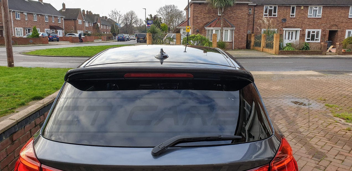 BMW 1 Series F20 M-Sport CT Carbon spoiler with 3D design, showcasing sleek, sporty carbon fiber finish on the car's rear.