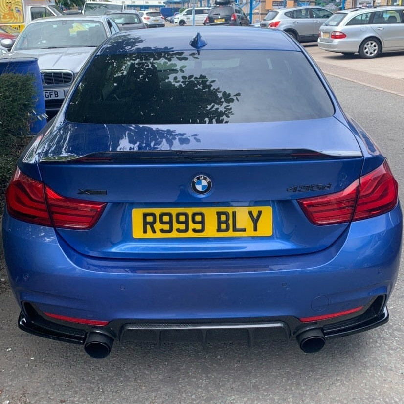 BMW F32 4 Series Carbon Fibre Spoiler by CT Carbon, showcasing sleek V2 design on a sporty coupe.