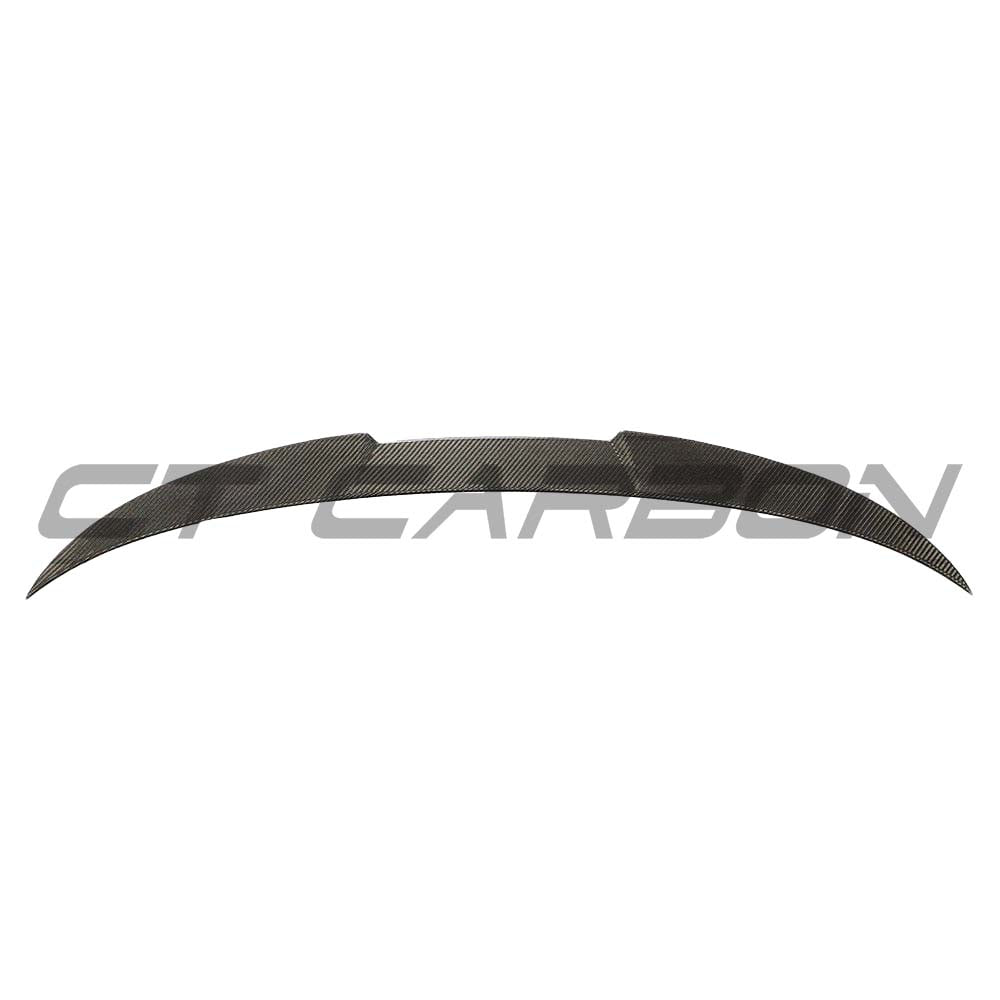 BMW G83 M4 full carbon fibre kit by CT Carbon, featuring a sleek carbon fibre spoiler on the sport coupe.