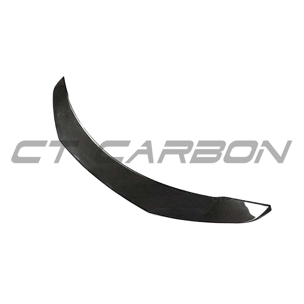 Tesla Model 3 2017-2023 CT Carbon V1 carbon fiber spoiler, side view showcasing sleek aerodynamic design.