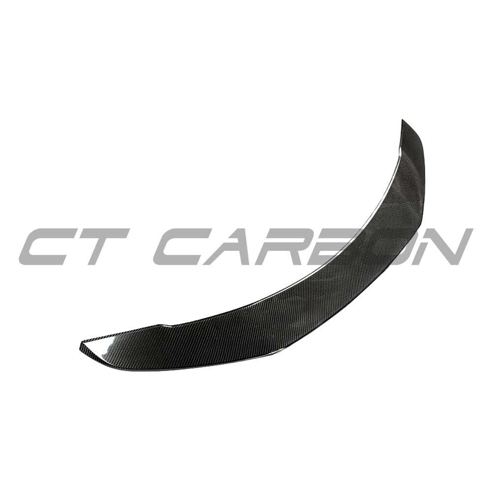 Carbon fibre spoiler for Tesla Model 3 2017-2023 by CT Carbon, V1 style, shown on the car's rear with sleek aerodynamic design.