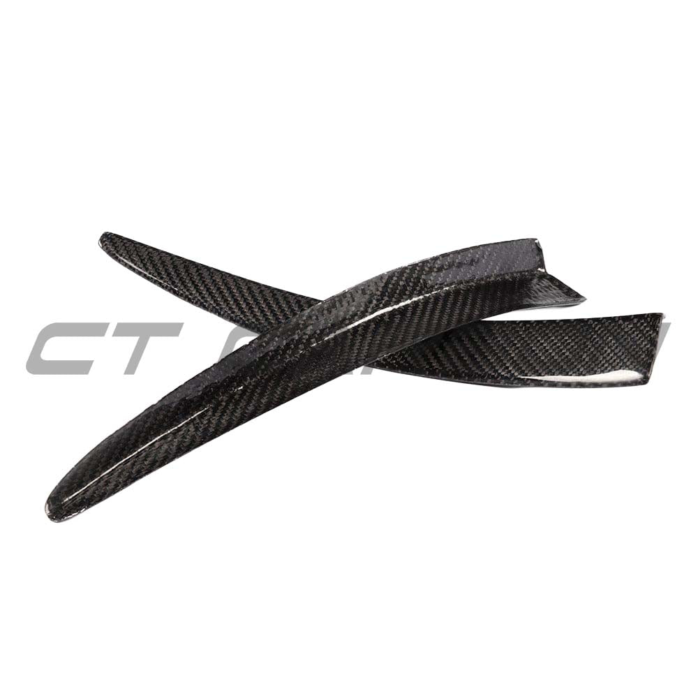 BMW M3 M4 F80 F82 F83 carbon fiber canard fins by CT Carbon, showing sleek aerodynamic accessories on a sports car.