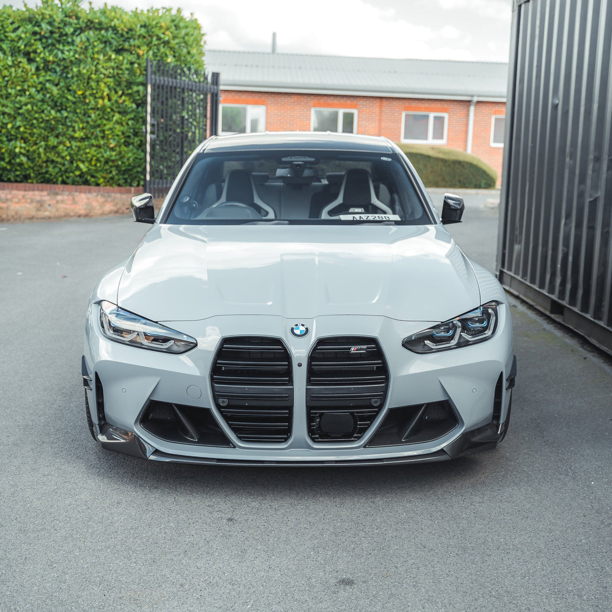 BMW M3 M4 G80 G82 G83 carbon fibre splitter by CT Carbon, showing the sleek, lightweight MP-style aerodynamic car part.