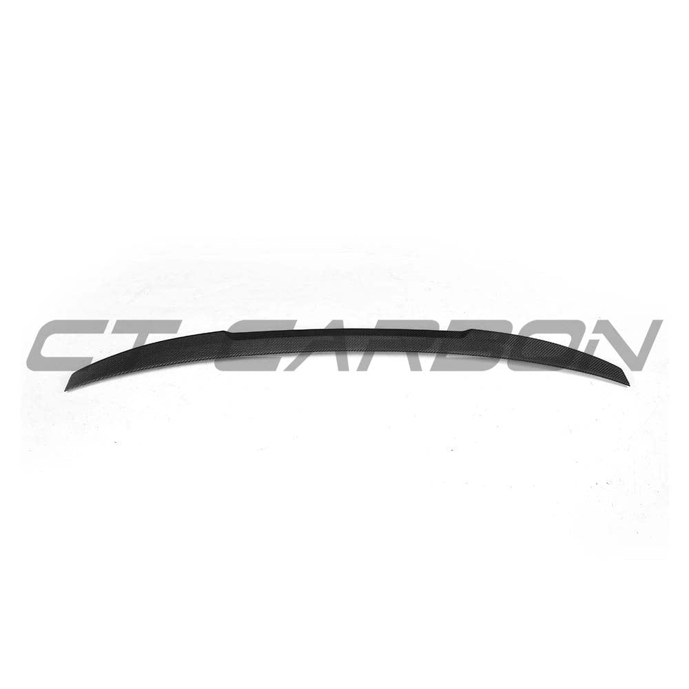 BMW M5 F90 and G30 5 Series carbon fibre spoiler by CT Carbon, M4 style, installed on vehicle, showcasing sleek aerodynamic design.