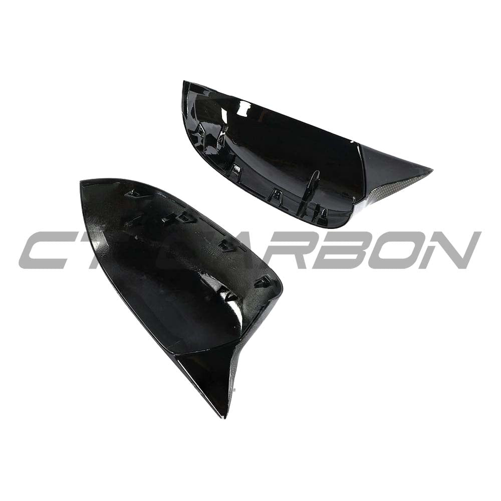 BMW X3/X4/X5/X6 G01/G02/G05/G06 Carbon Fibre Mirrors by CT Carbon, close-up of sleek, aerodynamic mirror caps.