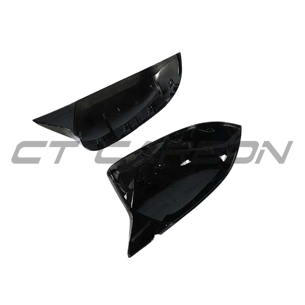 BMW X3, X4, X5, X6 G01, G02, G05, G06 carbon fiber mirrors by CT Carbon, shown on vehicle.