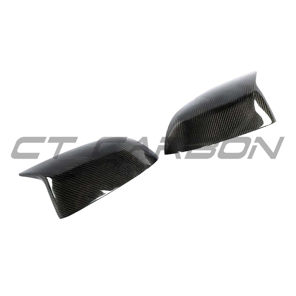 BMW X3/X4/X5/X6 G01/G02/G05/G06 carbon fiber mirrors by CT Carbon, showcasing sleek, lightweight, aerodynamic mirror covers.
