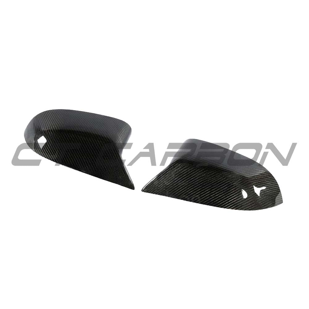 BMW X3/X4/X5/X6 G01/G02/G05/G06 carbon fiber mirrors by CT Carbon, showing sleek, lightweight mirror covers on vehicle side.