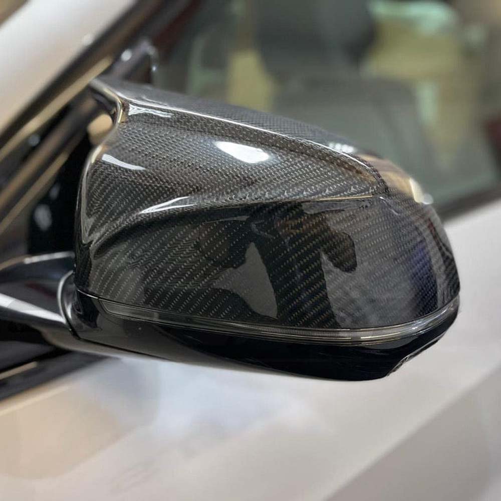 Carbon fibre side mirrors for BMW X3, X4, X5, X6 G01, G02, G05, G06 by CT Carbon, showcasing sleek, lightweight design.