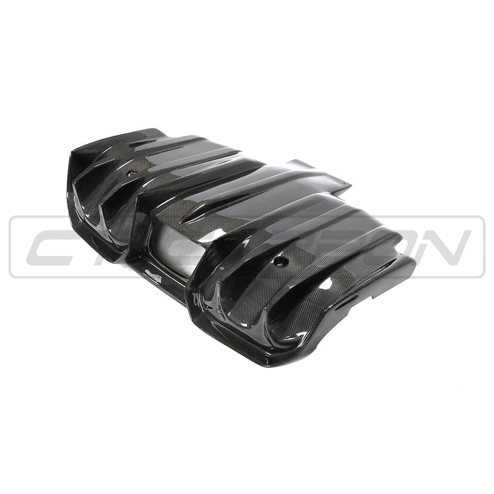 Mini F56 Cooper S JCW carbon fiber diffuser by CT Carbon, showing sleek, aerodynamic design for enhanced vehicle performance.