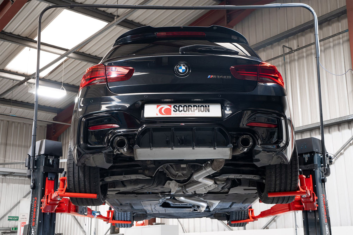 Scorpion BMW M140i and M240i OEM resonator delete pipe installed on F20, F21, F22 models, showcasing the exhaust modification.