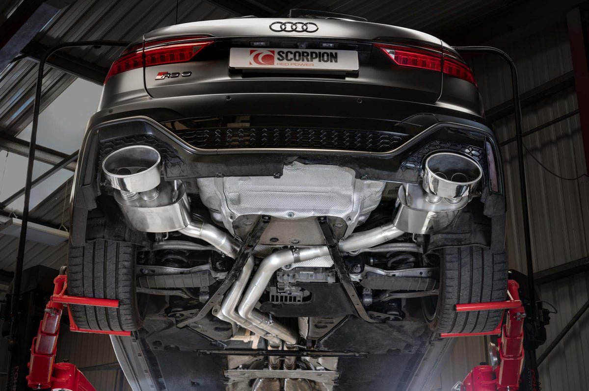 Scorpion Audi RS6 C8 or RS7 C8 Half Exhaust System showing polished metal pipes and exhaust tips on a black background.