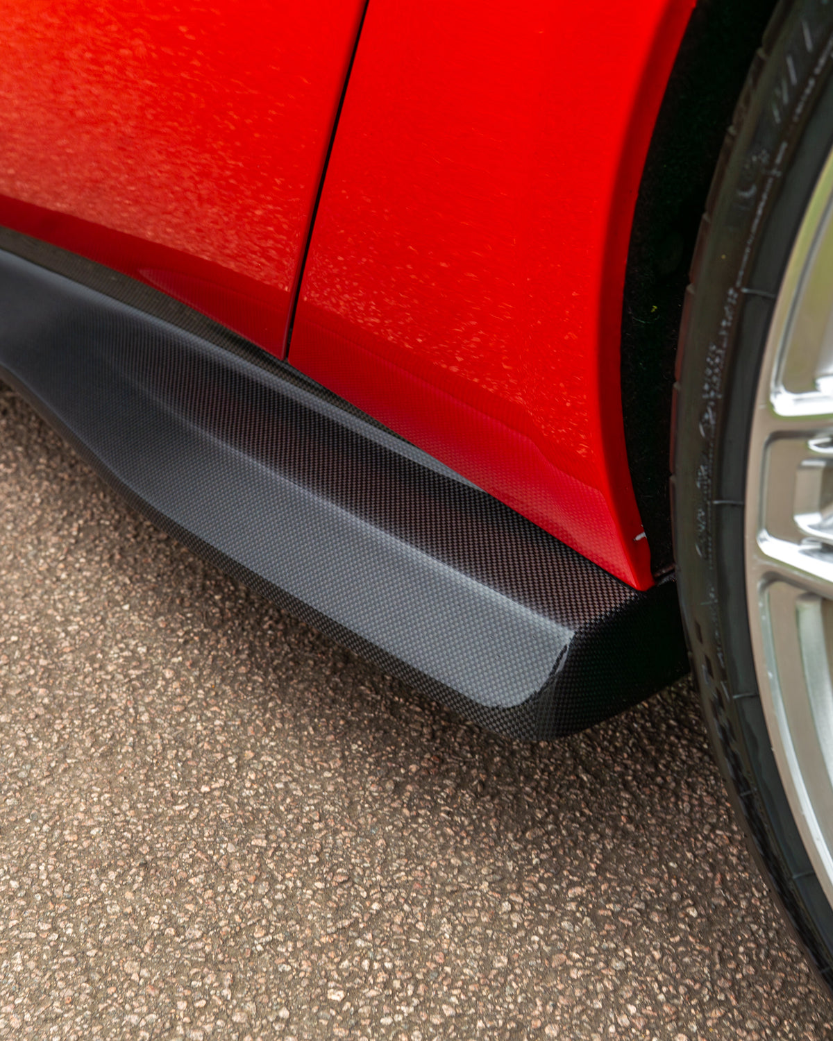 Carbon fibre side skirts extension kit for Ferrari 812 Superfast by CT Carbon, showcasing sleek, lightweight racing-inspired design.
