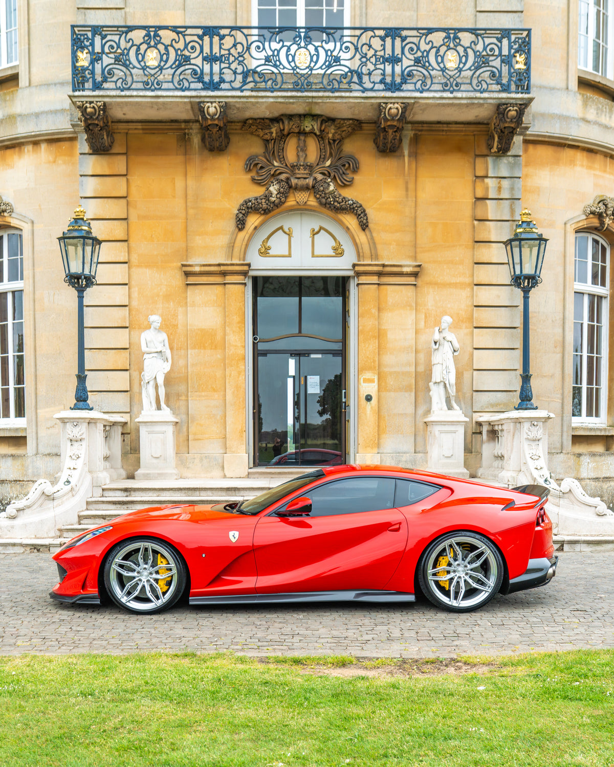 Ferrari 812 Superfast side skirts extension kit in carbon fiber by CT Carbon, shown on the car's side profile.