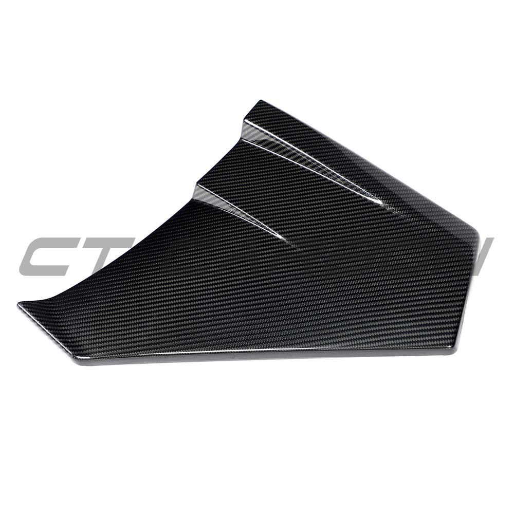 Lamborghini Revuelto carbon fiber door trim side skirts by CT Carbon, showcasing sleek, textured carbon fiber surface and precise fit.
