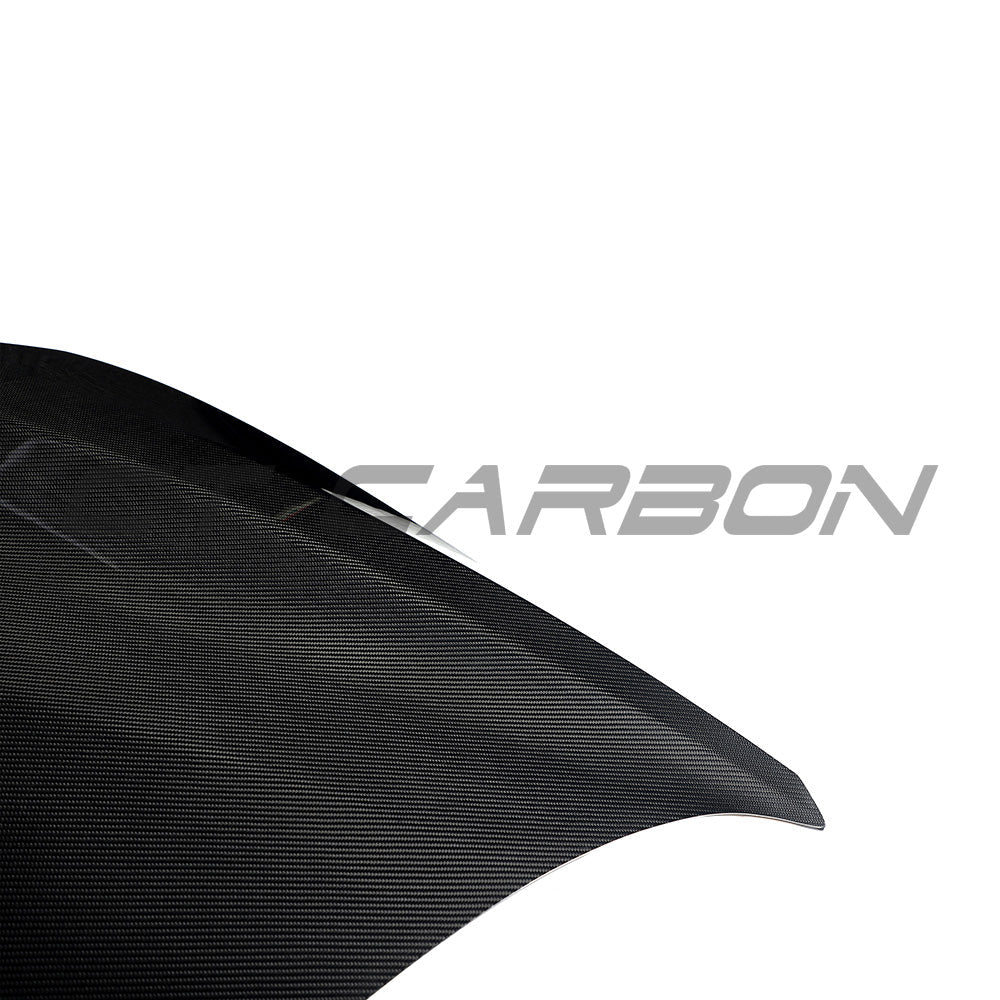 BMW F87 M2 and F22 1 Series carbon fibre bonnet by CT Carbon, showcasing lightweight, aerodynamic design with a smooth finish.