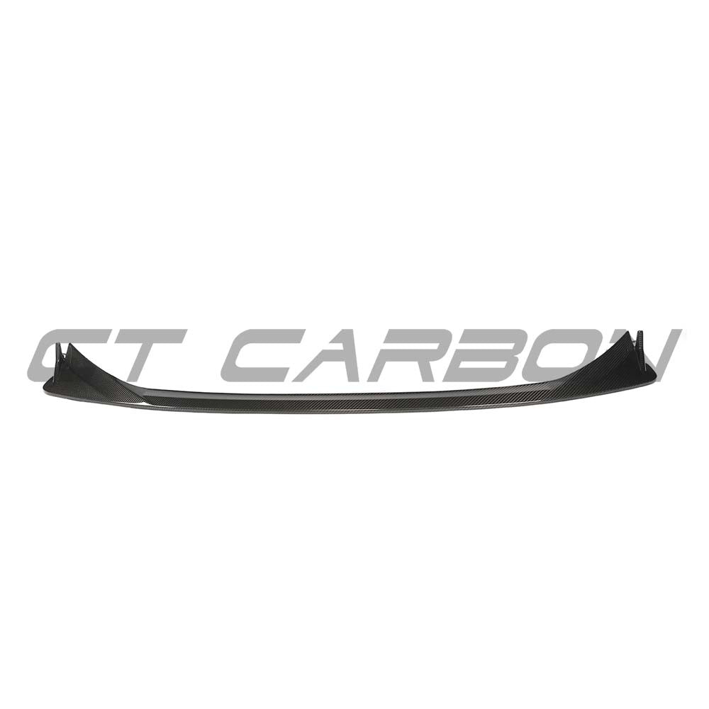 BMW G82 M4 full carbon fiber kit by CT Carbon, showing sleek, lightweight carbon fiber components on the car.