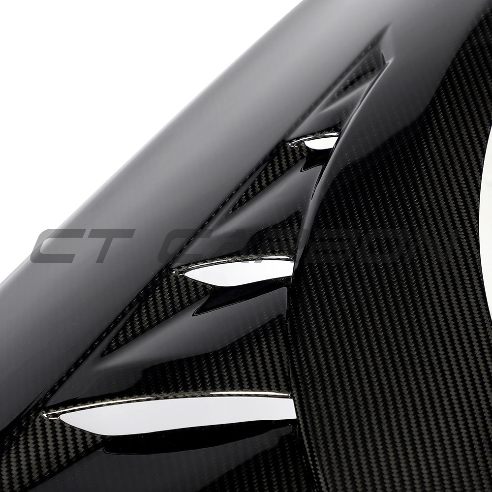 BMW F87 M2 Carbon Fibre Fenders by CT Carbon, close-up of sleek, lightweight carbon fiber fenders on the sports car.