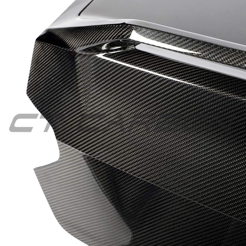 BMW G87 M2 CT Carbon full carbon fibre kit installed, showcasing sleek, lightweight carbon fiber components on the car.