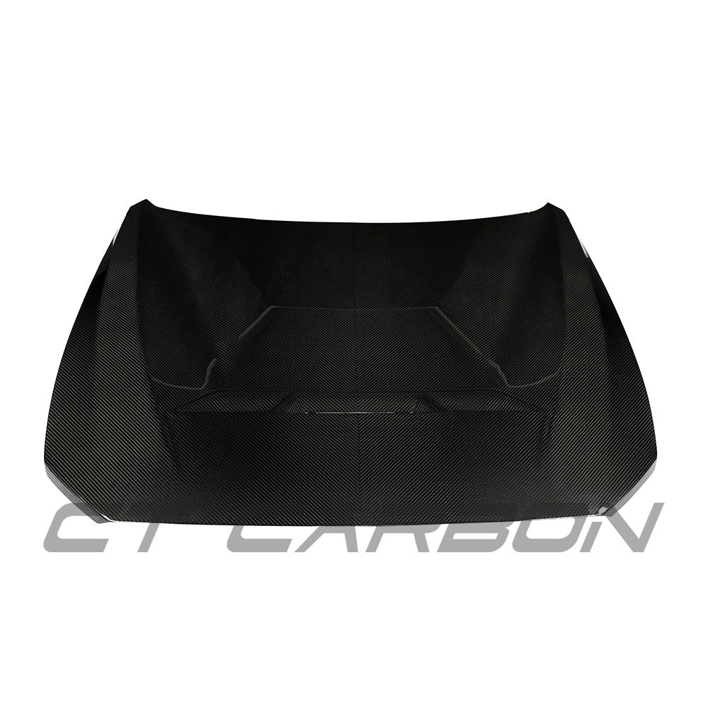 BMW F87 M2 and F20/F22 1 & 2 Series carbon fibre bonnet by CT Carbon, showing lightweight, glossy carbon fiber surface and aerodynamic design.