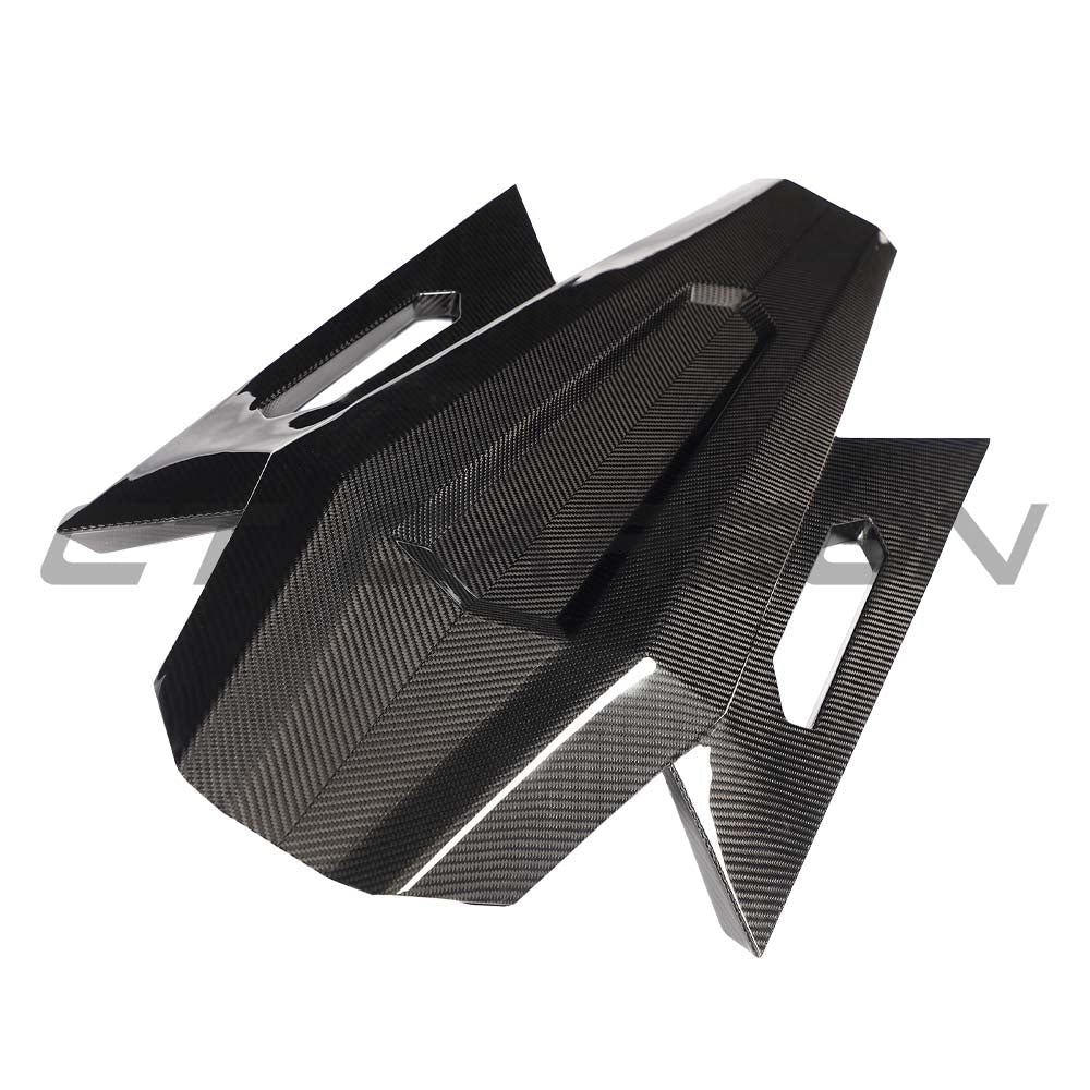 CT Carbon Lamborghini Revueltó carbon fiber engine cover and roof scoop, showing sleek, lightweight design and aerodynamic features.