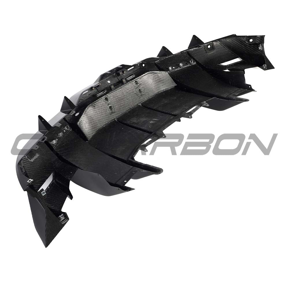 Lamborghini Revuelto carbon fibre rear diffuser by CT Carbon, showcasing sleek aerodynamic design and detailed craftsmanship.