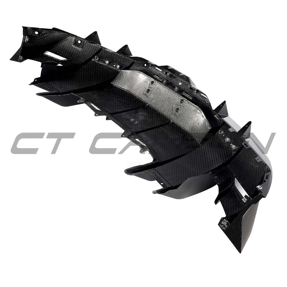Lamborghini Revuelto carbon fibre rear diffuser by CT Carbon, showcasing sleek aerodynamic design and textured finish.