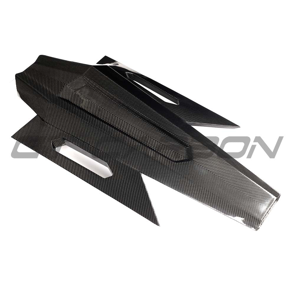 CT Carbon Lamborghini Revueltó carbon fibre engine cover and roof scoop, showcasing sleek design and aerodynamic features.