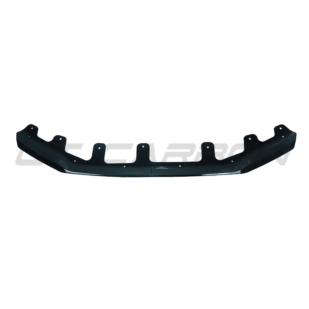 BMW U11 X1 2023 gloss black splitter by CT Carbon, front lip with V2 design, enhances vehicle’s sporty appearance and aerodynamics.
