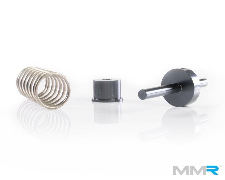MMX Performance N54/N55 low temp thermostat for BMW M135i engine, shown as a metal automotive engine part.