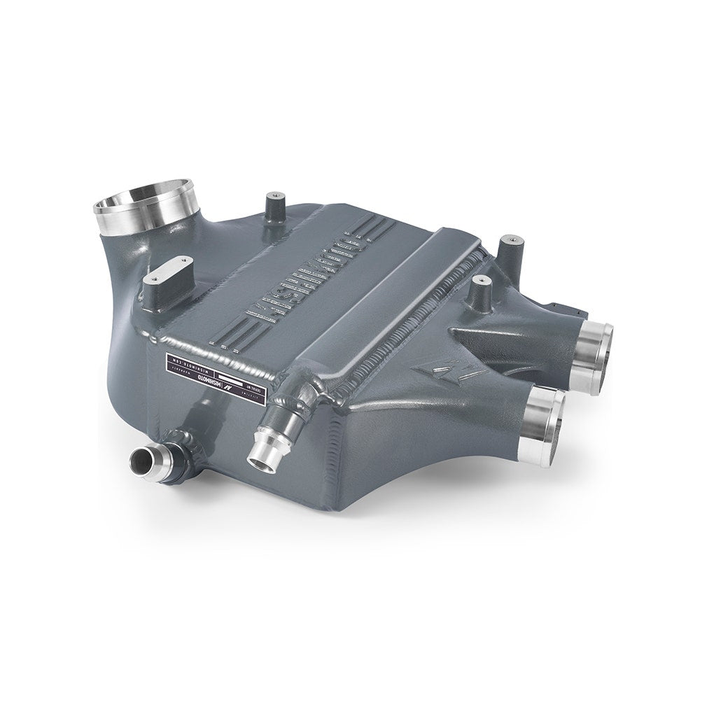 MISHIMOTO performance air-to-water intercooler for BMW F8X M3 and M4, color-matched engine parts for improved cooling.
