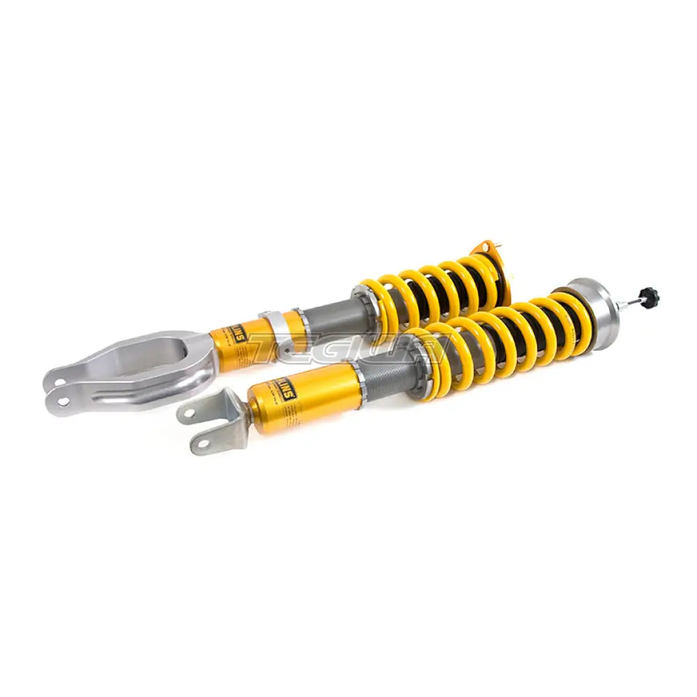 Ohlins Road & Track DFV coilovers installed on a Nissan GT-R R35, showcasing the high-performance suspension components.