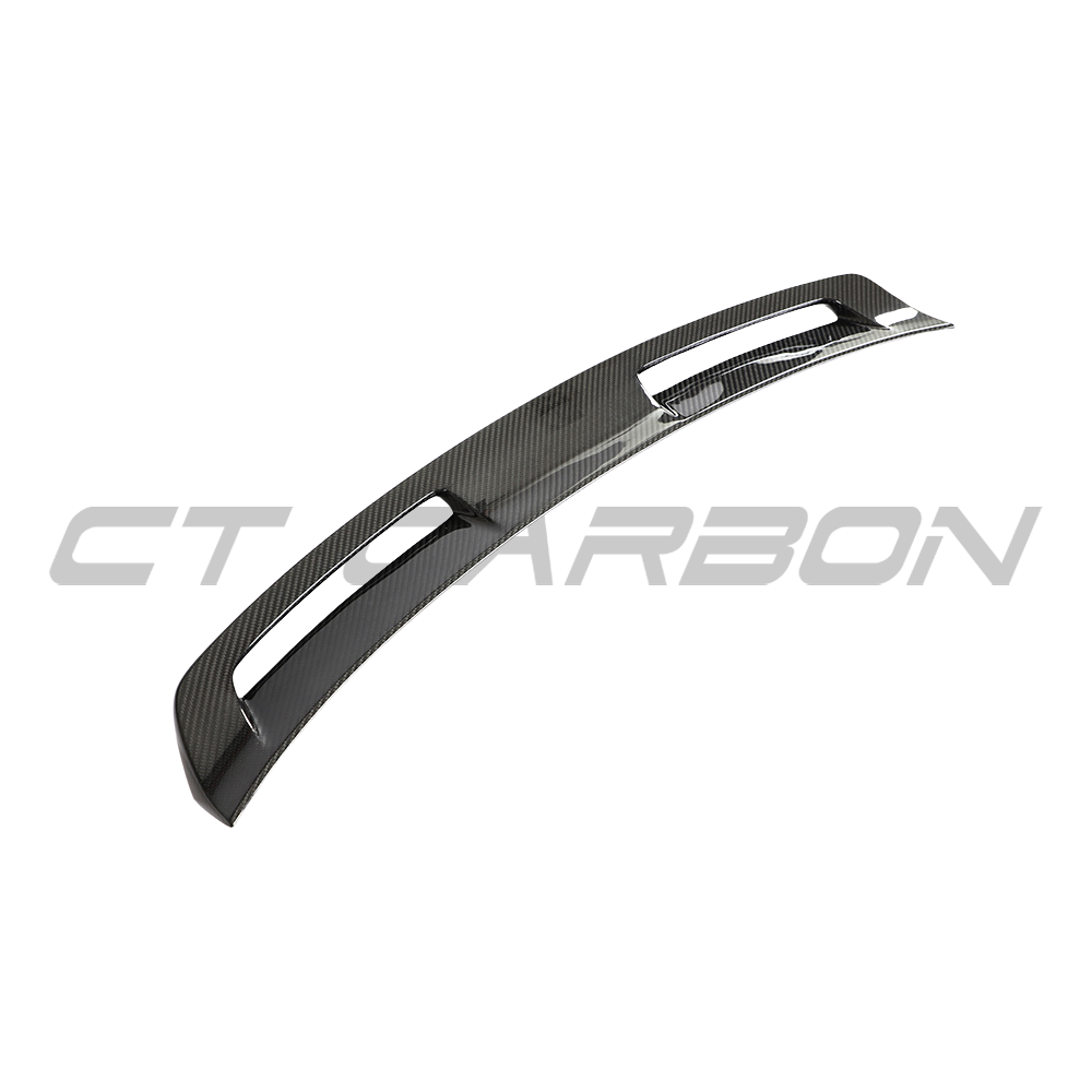 Porsche 911 992 Carrera carbon fibre spoiler by CT Design, showcasing the sleek, aerodynamic design and textured carbon fiber surface.